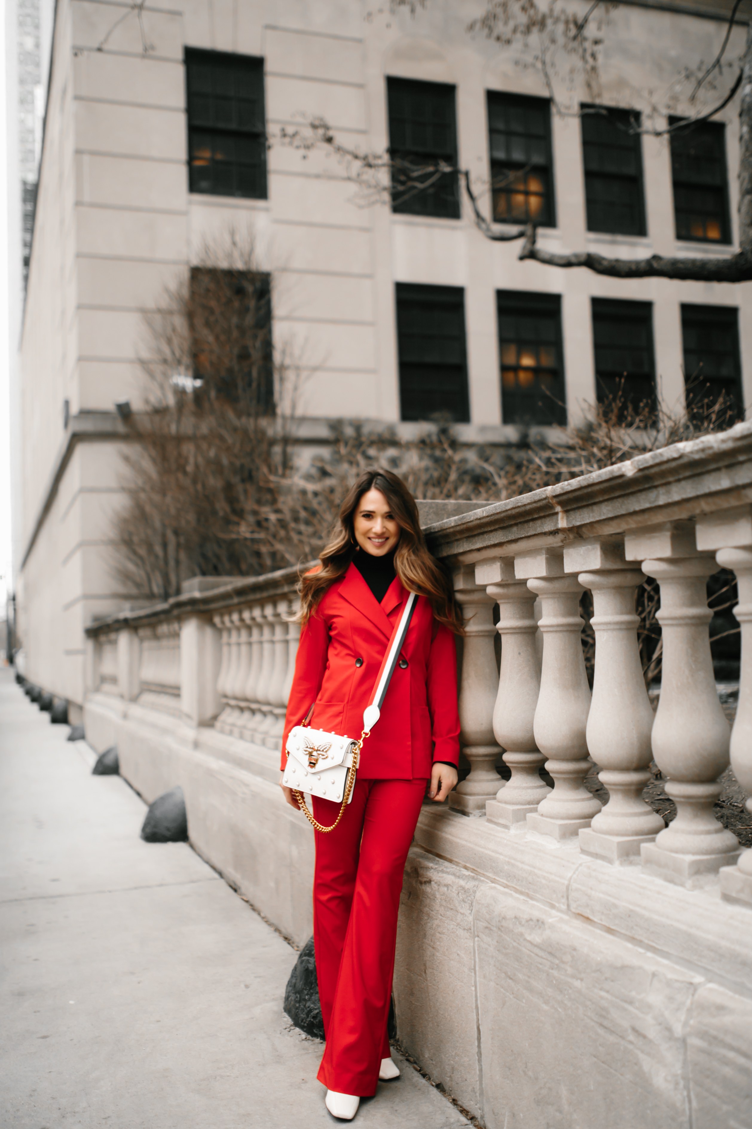red-suit-gigi-hadid-outfit-inspo-white-gucci-bumble-bee-purse