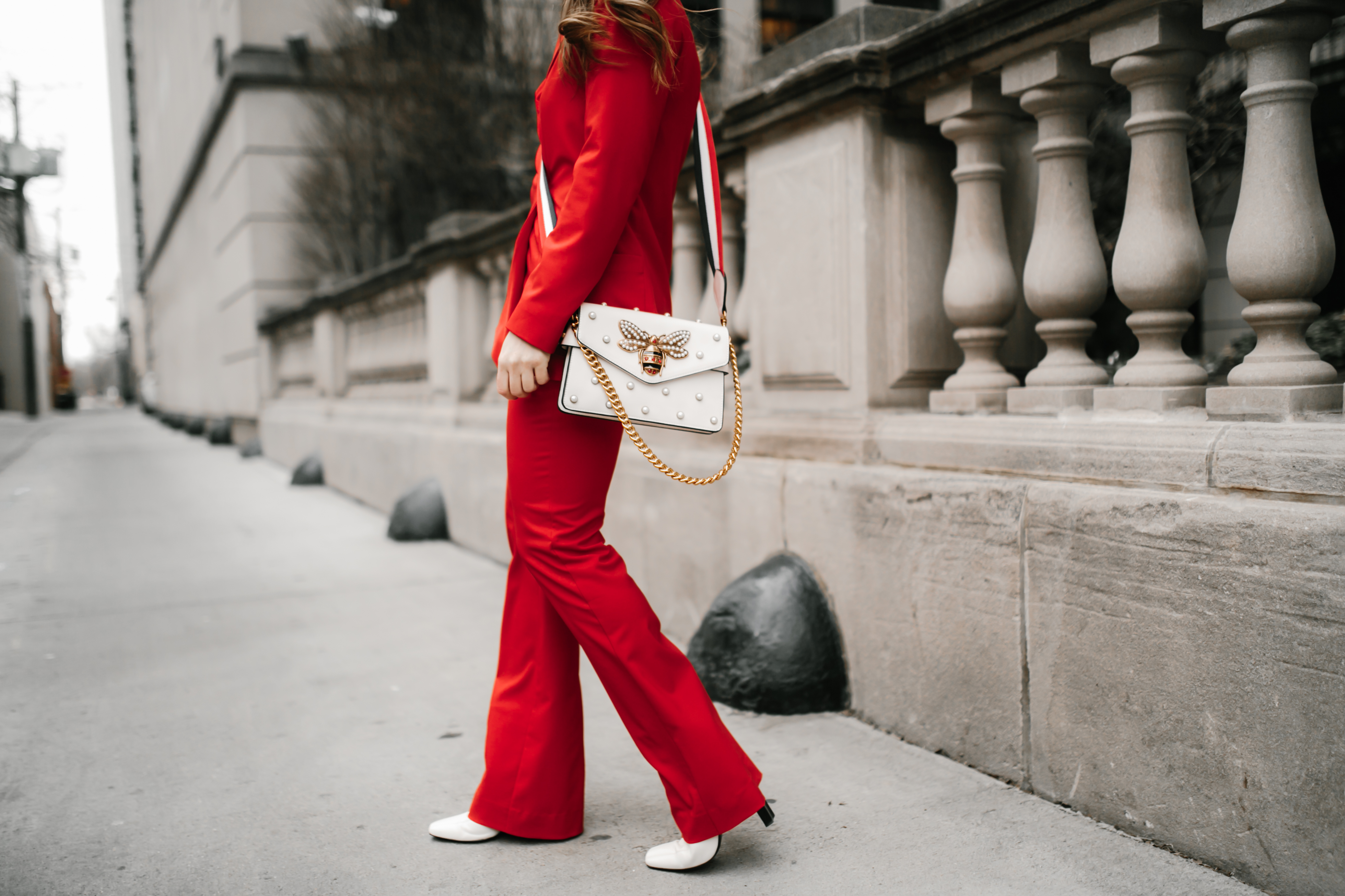 red-suit-gigi-hadid-outfit-inspo-white-gucci-bumble-bee-purse