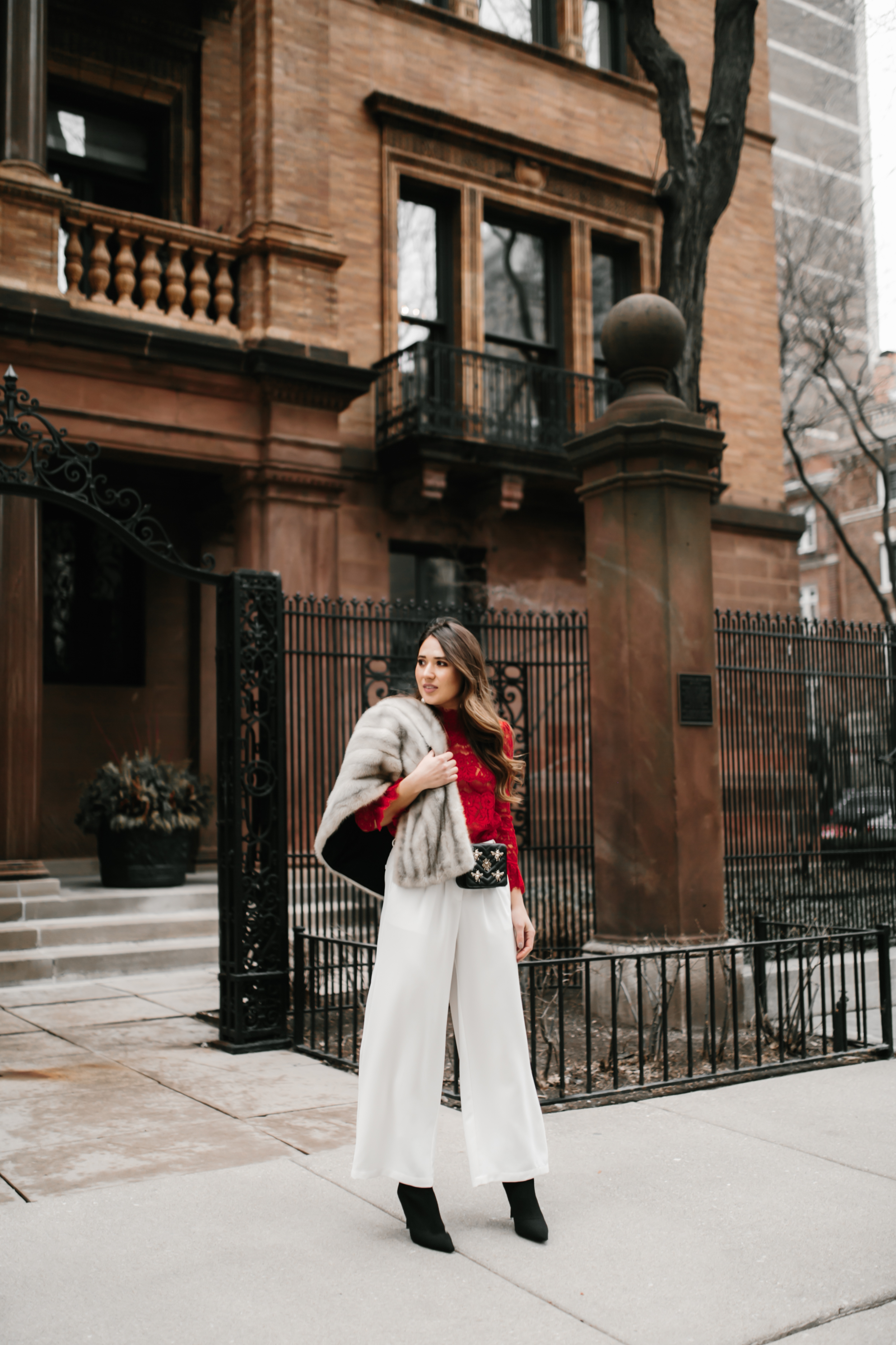 sexy-red-lace-top-white-wide-leg-pants-gucci-belt-bag-fanny-pack-fur-stole-shawl-outfit-inspo