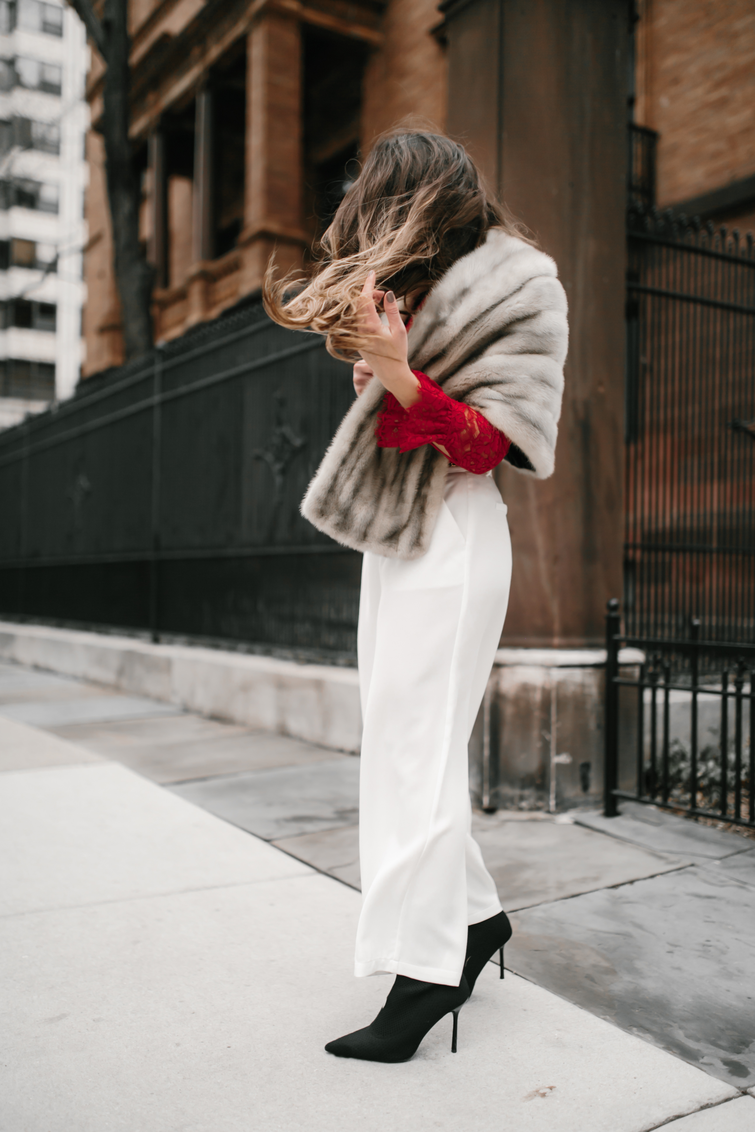 sexy-red-lace-top-white-wide-leg-pants-gucci-belt-bag-fanny-pack-fur-stole-shawl-outfit-inspo