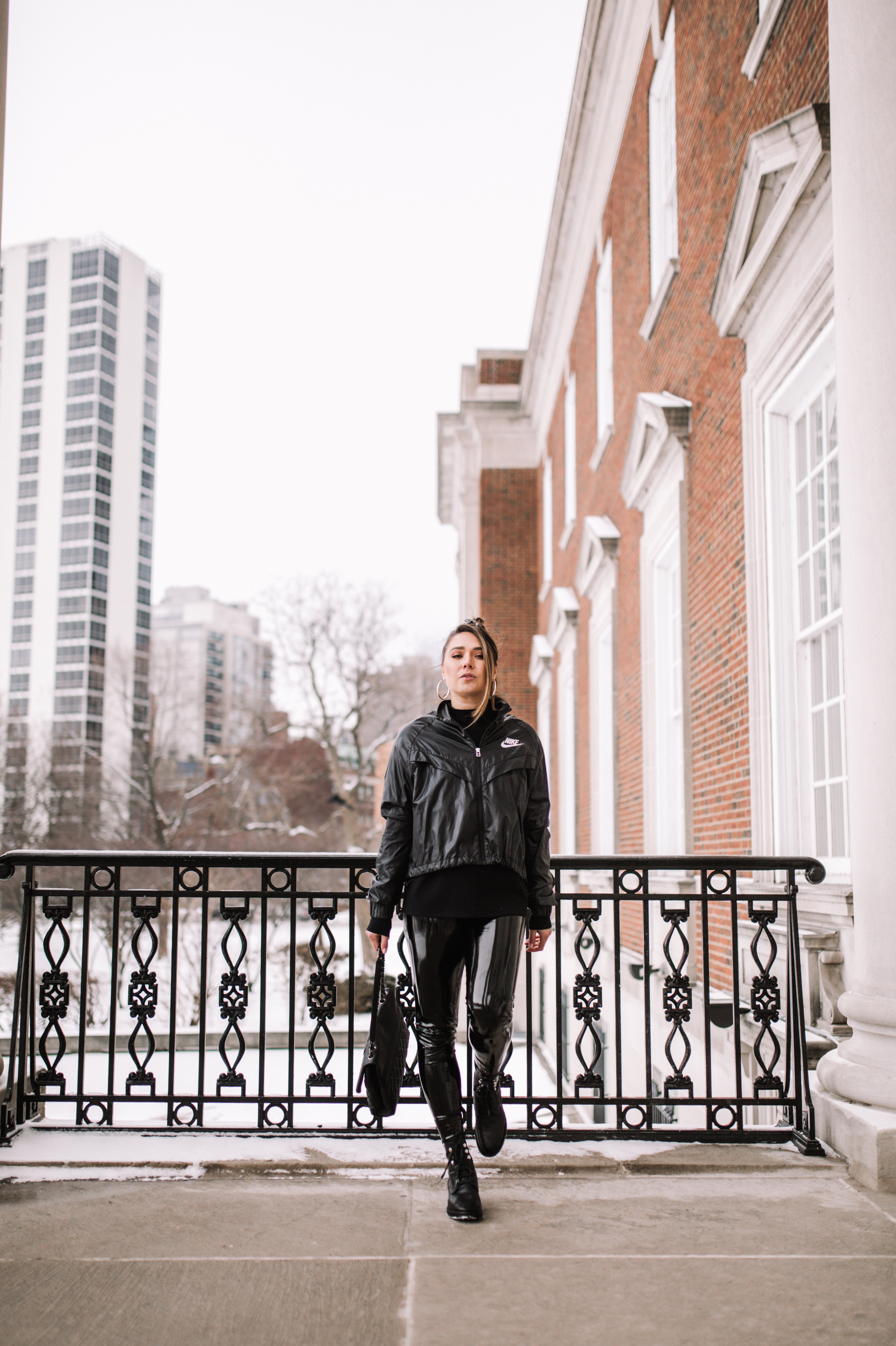 cool-girl-nike-outfit-commando-patenet-leather-legging-combat-boot-all-black-layers-nike-windbreaker