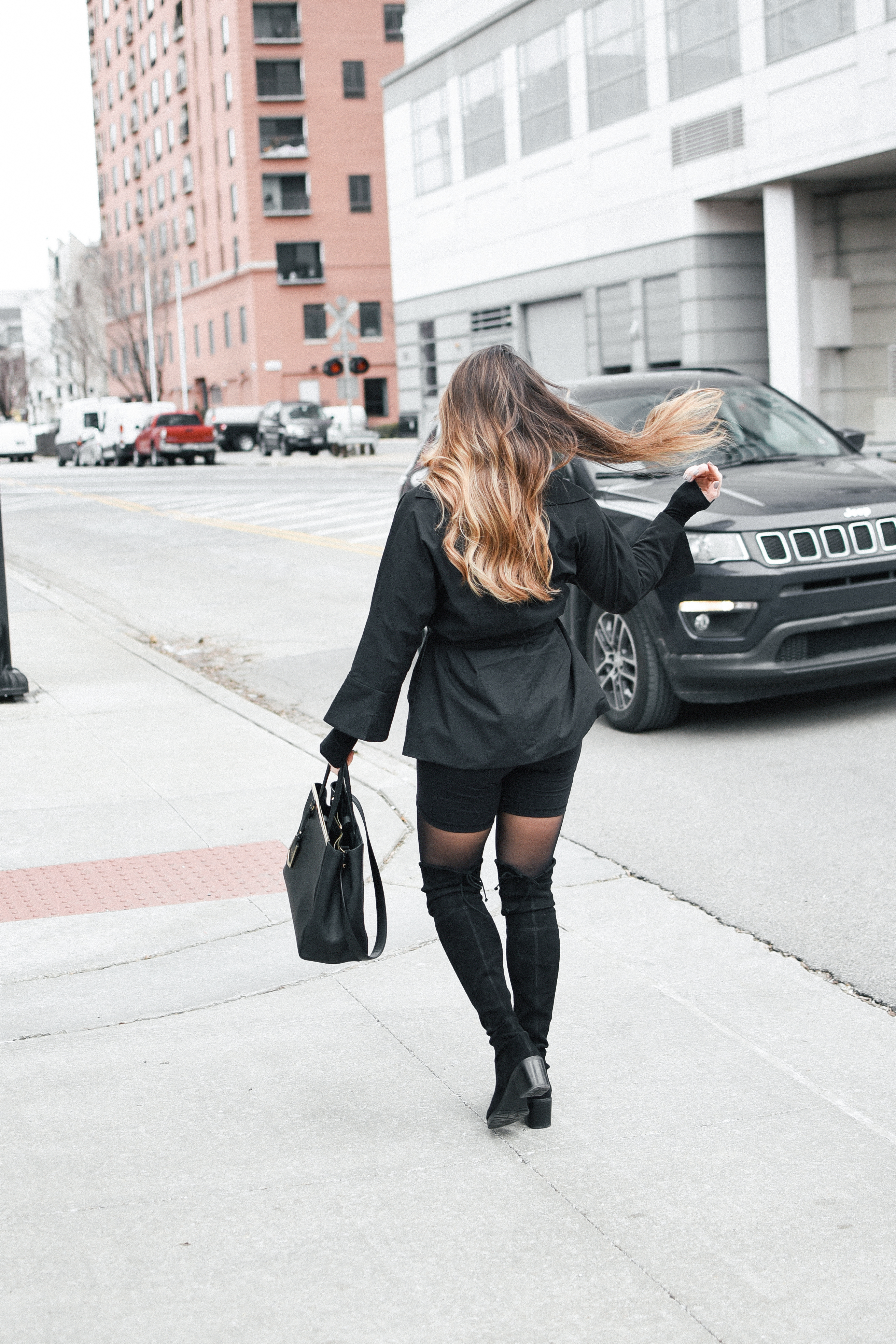 chic-biker-shorts-outfit-black-over-the-knee-boots-tights-tie-trench-fendi-purse