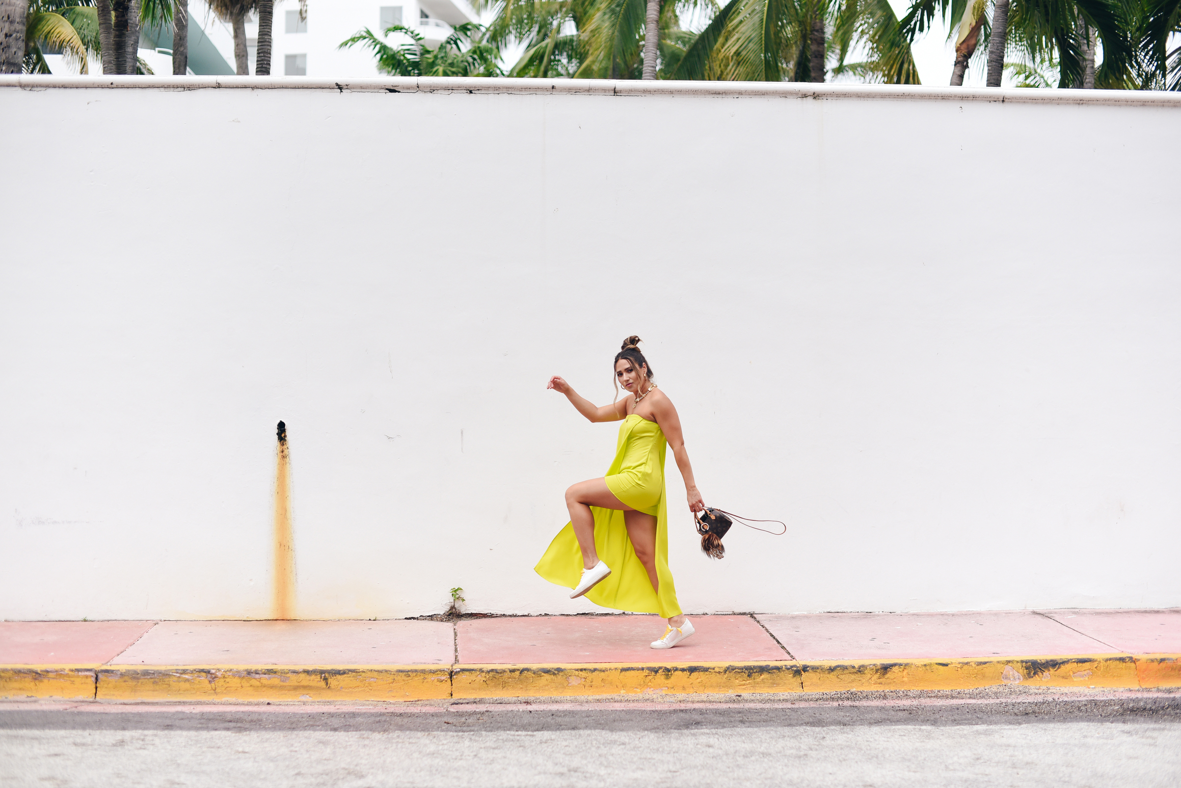 neon-green-dress-trend-sneakers-bright-laces-miami-swim-week-street-style-look