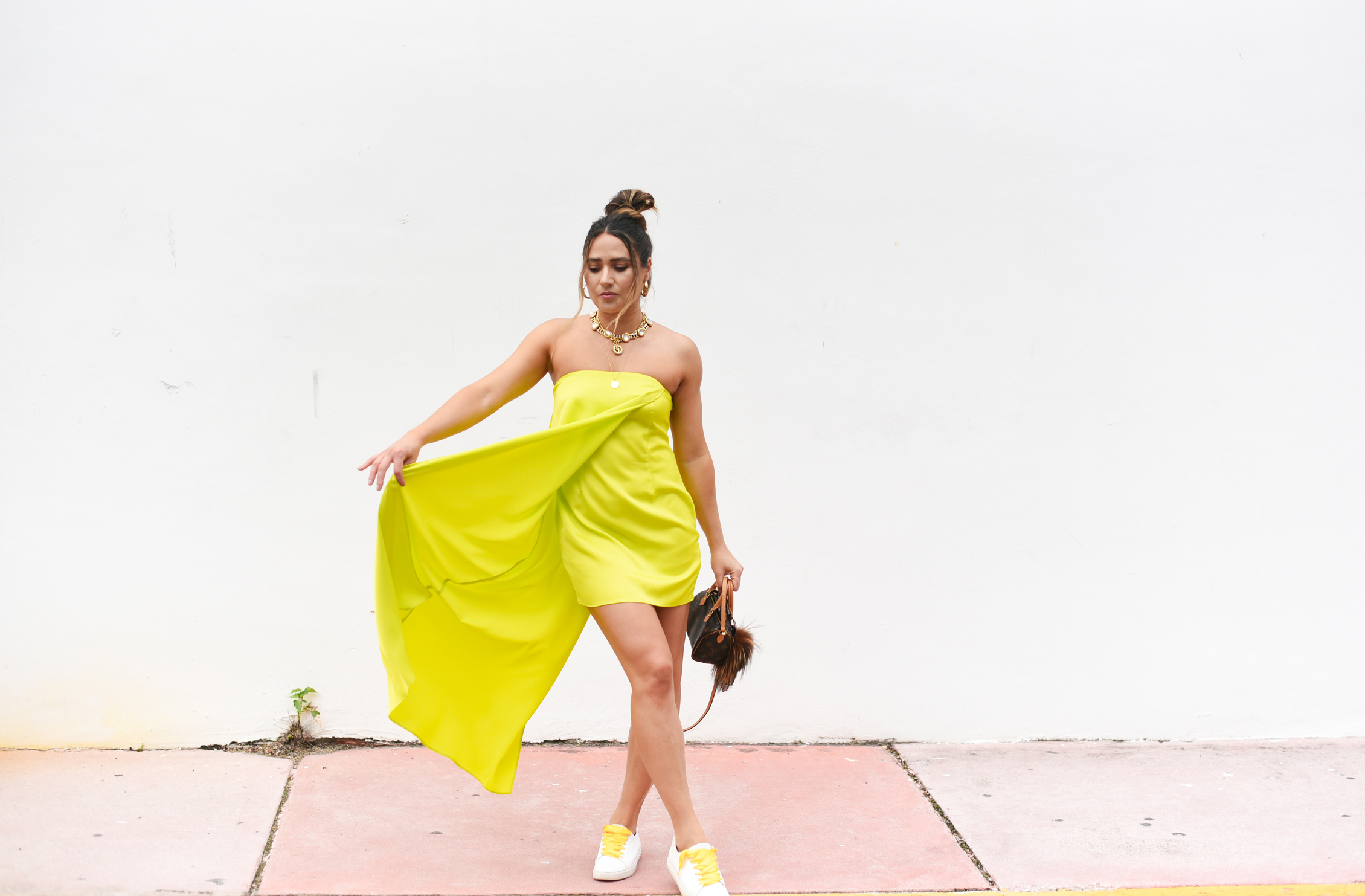 neon-green-dress-trend-sneakers-bright-laces-miami-swim-week-street-style-look