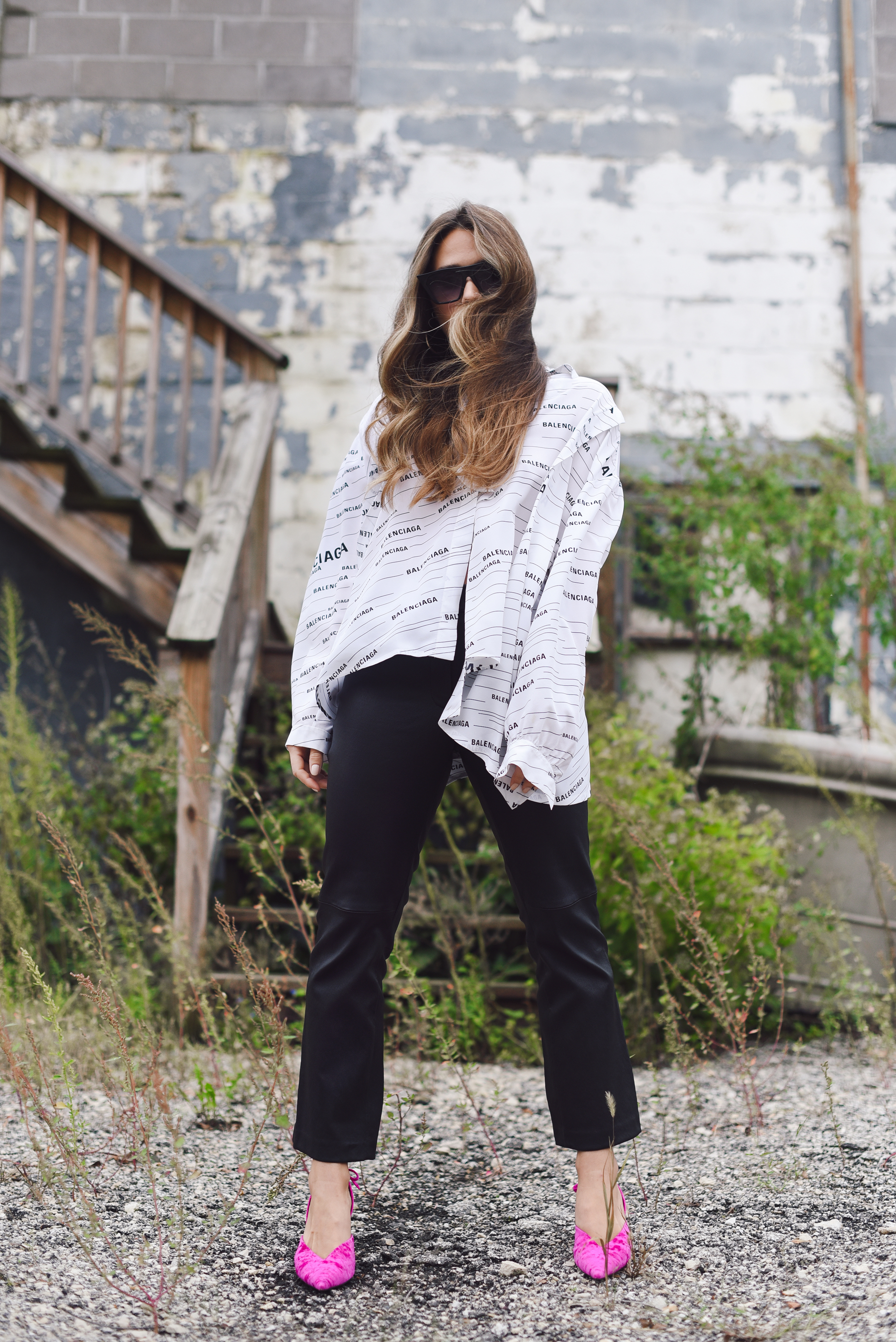 balenciaga-shirt-leather-pants-pink-pump-sparkle-jean-jacket-street-style-outfit