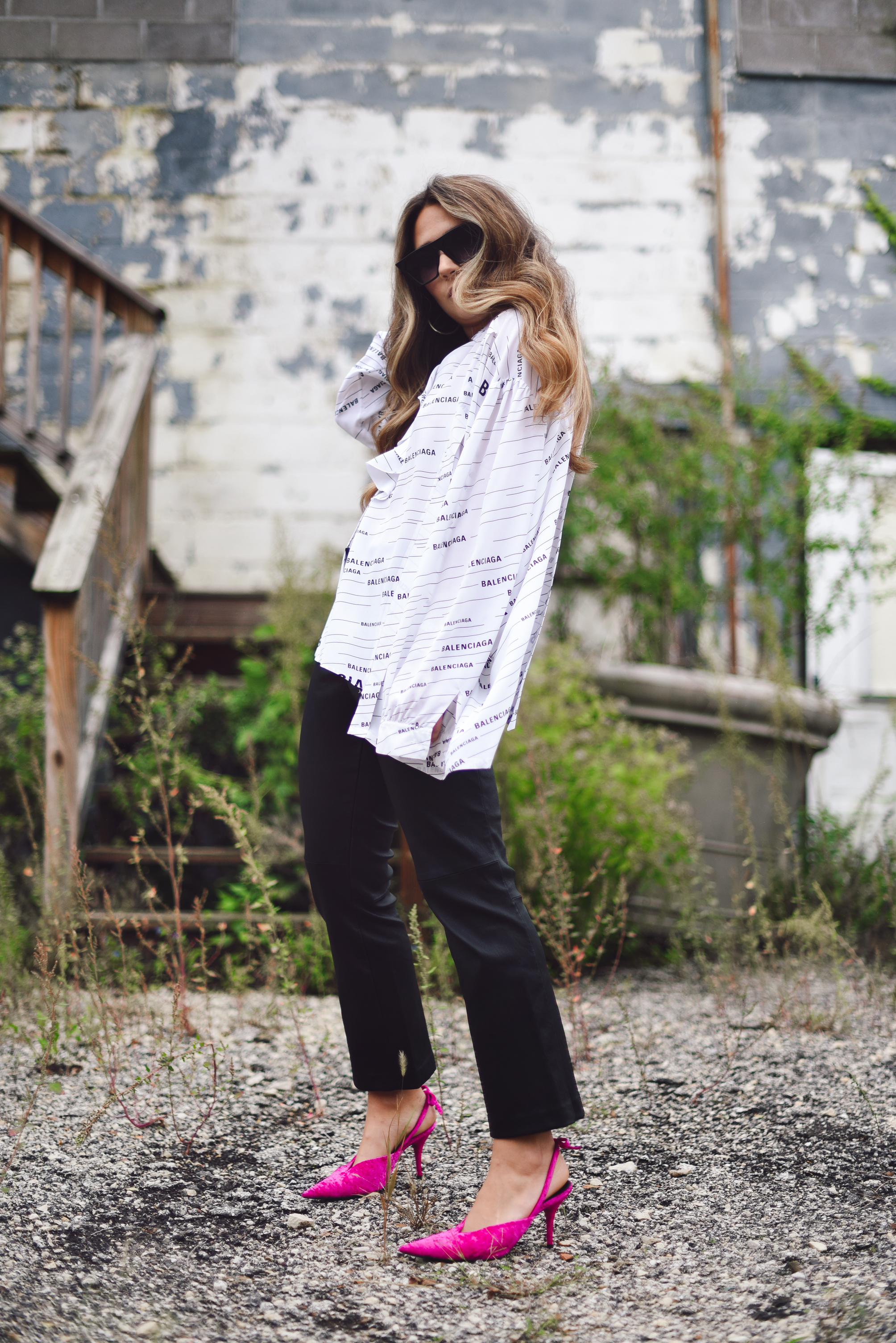 balenciaga-shirt-leather-pants-pink-pump-sparkle-jean-jacket-street-style-outfit