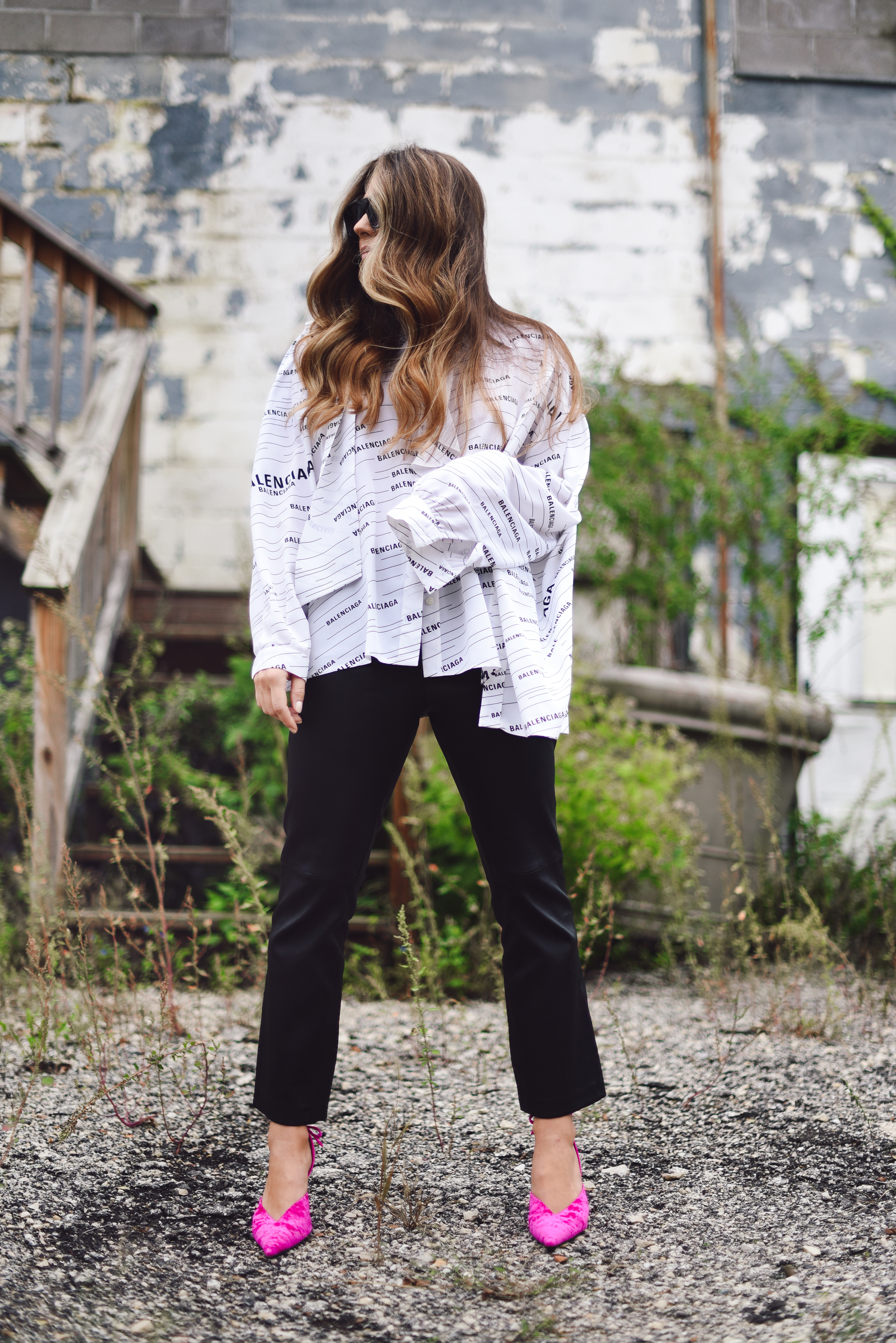 balenciaga-shirt-leather-pants-pink-pump-sparkle-jean-jacket-street-style-outfit