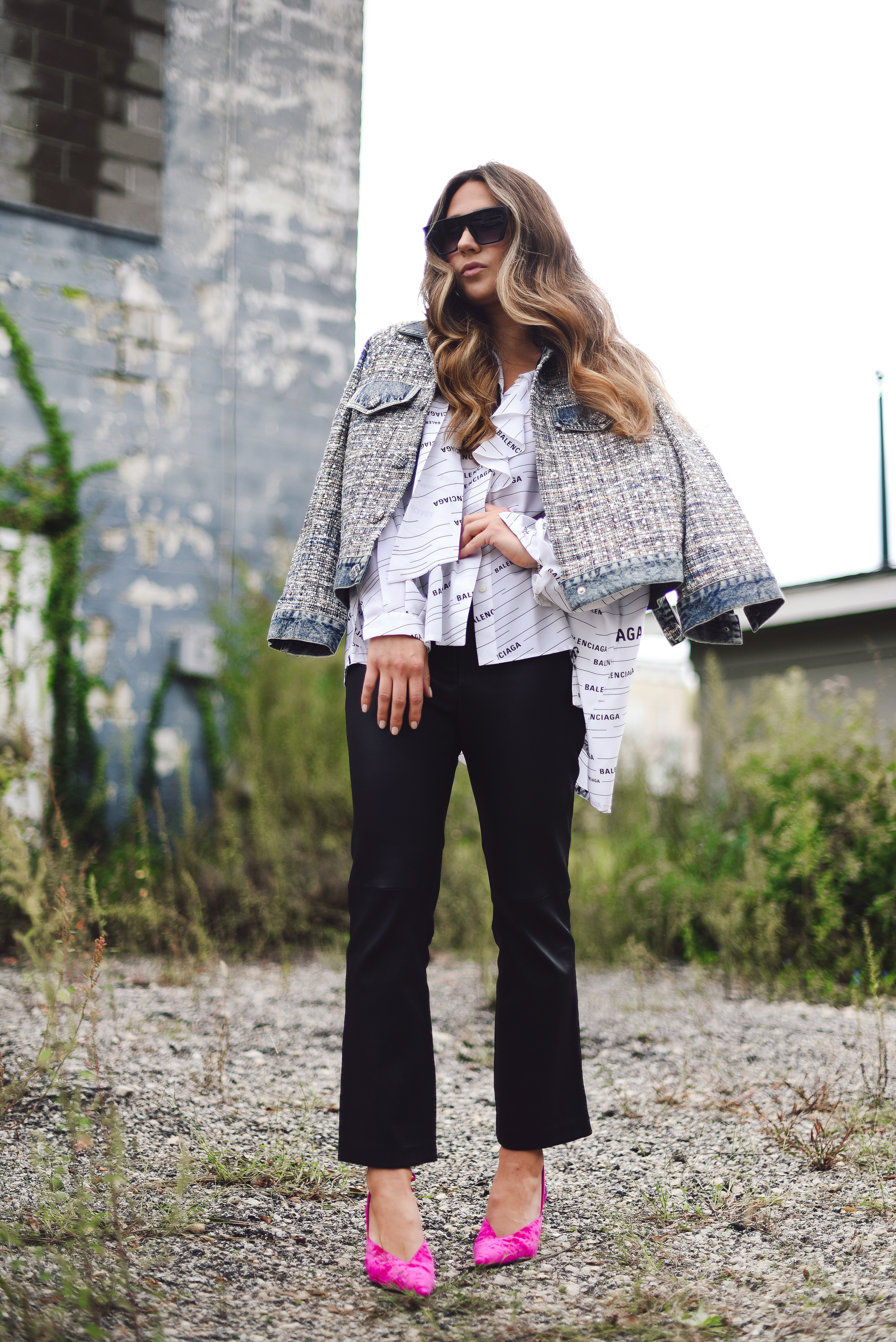 balenciaga-shirt-leather-pants-pink-pump-sparkle-jean-jacket-street-style-outfit