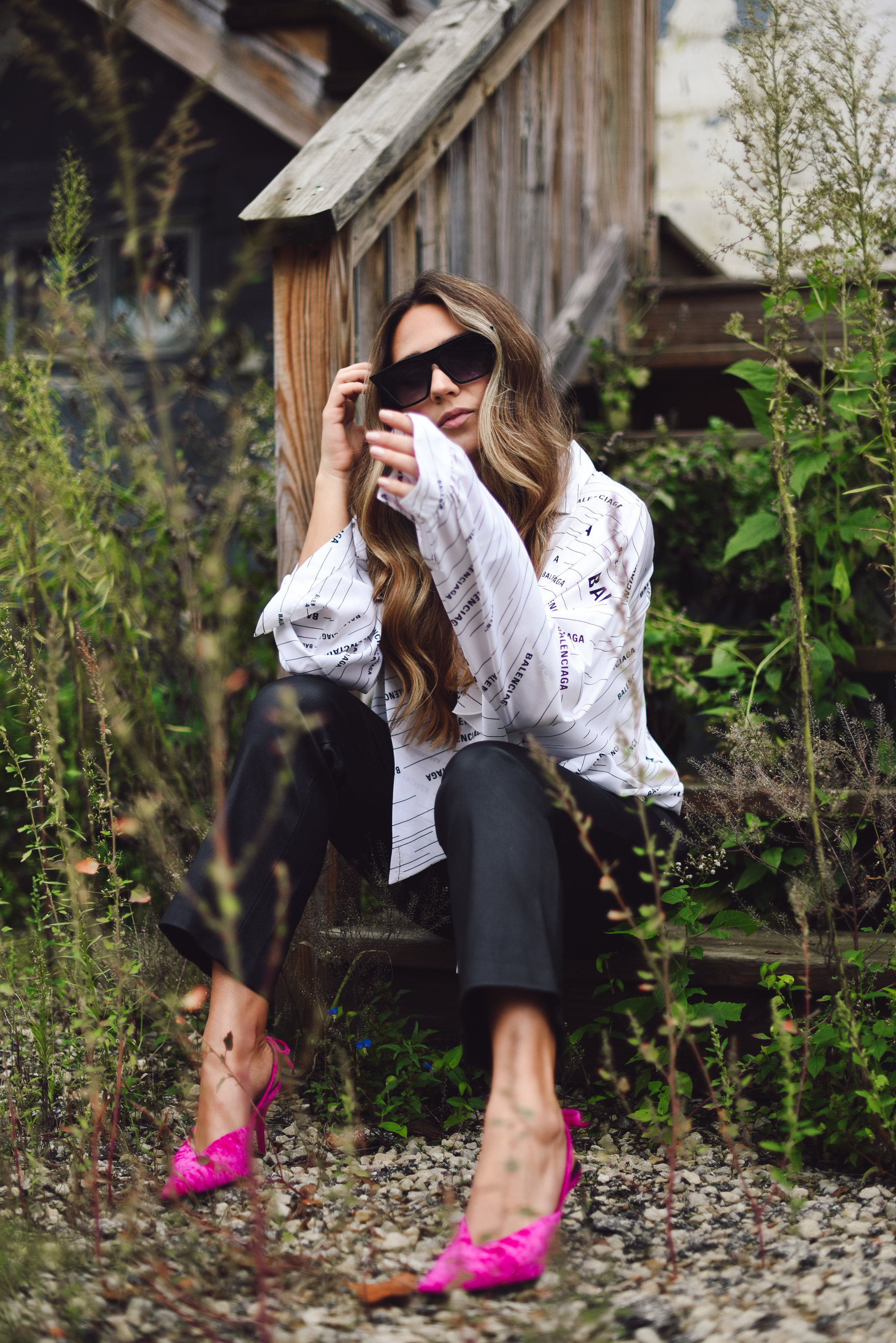 balenciaga-shirt-leather-pants-pink-pump-sparkle-jean-jacket-street-style-outfit